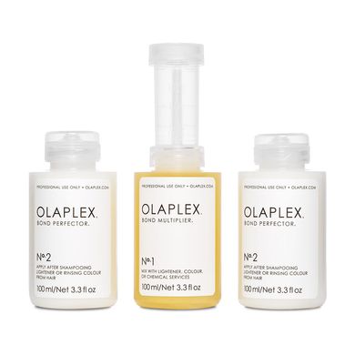 Дорожній набір для захисту фарбованого волосся Olaplex Traveling Stylist Kit 3х100 мл - основне фото