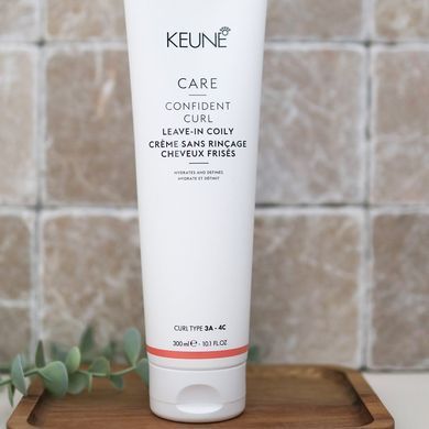Незмивний крем для волосся з вираженими завитками Keune Care Confident Curl Leave-In Coily Cream 3A-4C 300 мл - основне фото