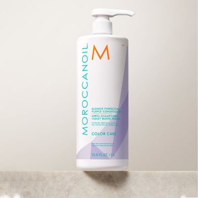 Оттеночный кондиционер для светлых волос Moroccanoil Blonde Perfecting Purple Conditioner 1000 мл - основное фото